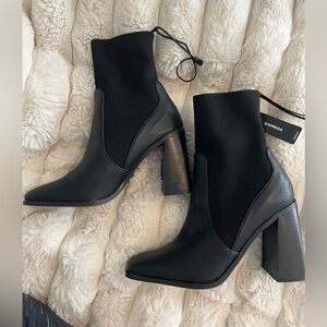 Block heel ankle sock boot